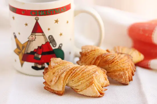 A cup and some pastries on the table