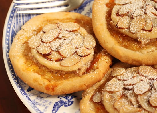 A close up of some pastries on a plate