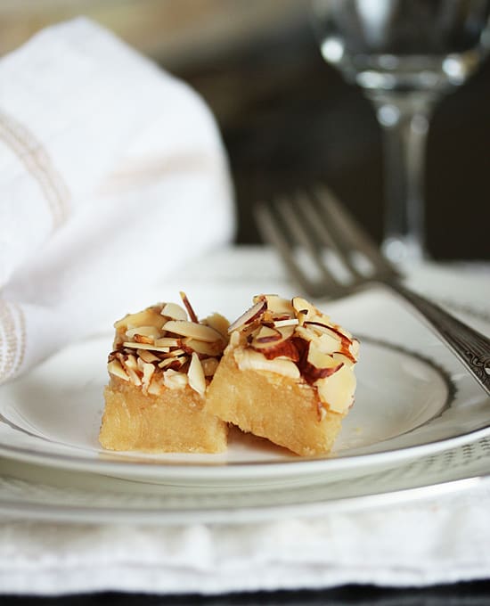 A plate with two pieces of cake on it