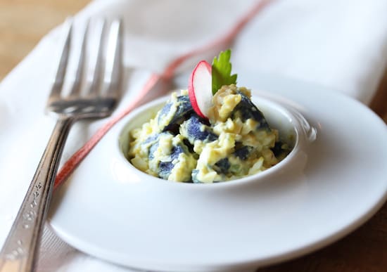 A bowl of food on top of a white plate.