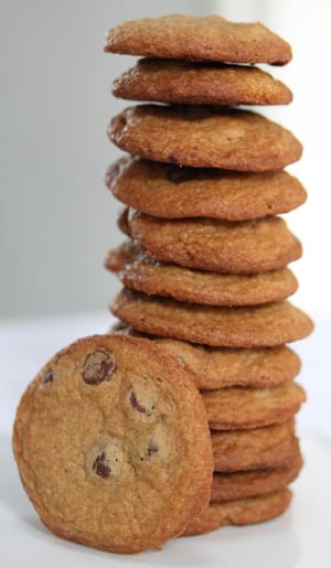 A stack of cookies with one cookie missing.