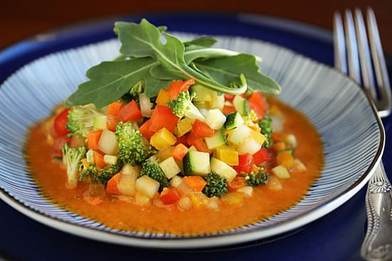 A plate of food with vegetables on it.