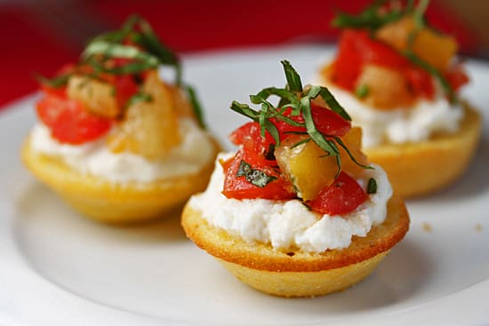 A white plate topped with three different types of food.