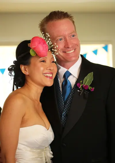 A man and woman smiling for the camera.