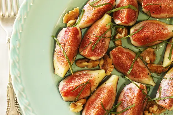 A plate of food that is on the table.