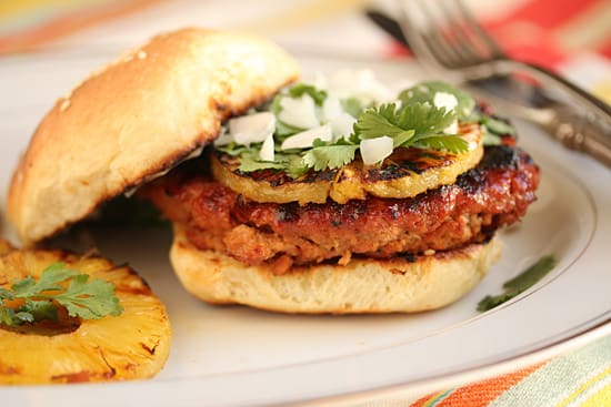 A close up of a burger on a plate