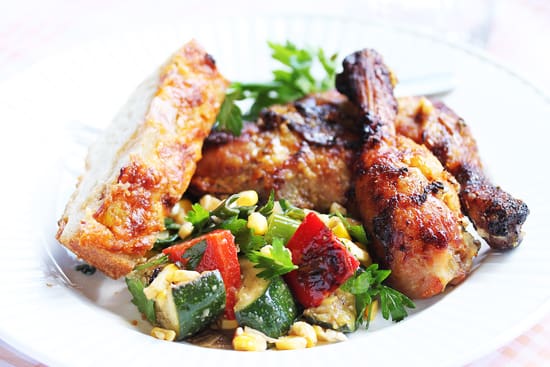 A plate of food with meat and vegetables.