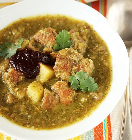 A bowl of stew with meat and potatoes.