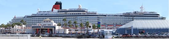 A cruise ship docked at the port of long beach.