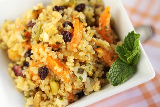 A bowl of food with rice and vegetables.