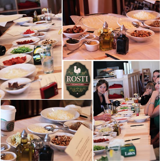 A group of people sitting at a table with food.