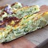 A close up of some food on a wooden board