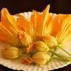 A paper plate with flowers on it