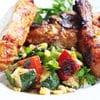 A plate of food with meat and vegetables.
