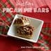 A white plate topped with two pieces of pecan pie bars.
