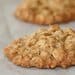 Two cookies are shown on a table.