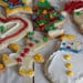 A table topped with lots of different cookies.