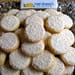 A pile of cookies sitting on top of a table.