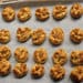A tray of cookies that are on the counter.